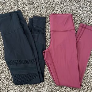 Pair of Lululemon Athletica size 6 leggings. NWOT. Charcoal gray and fuchsia.